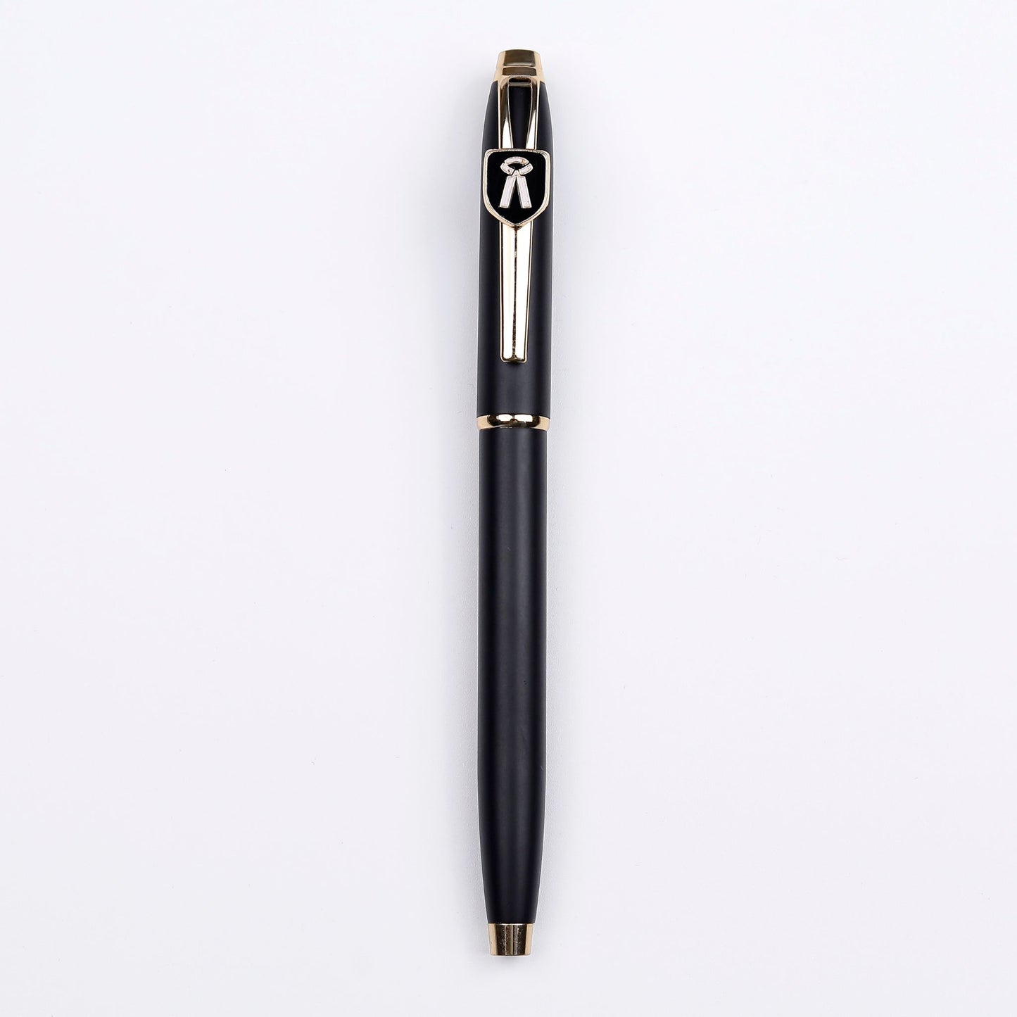 A black and gold ball pen with the brand symbol on the top, set against a white background.