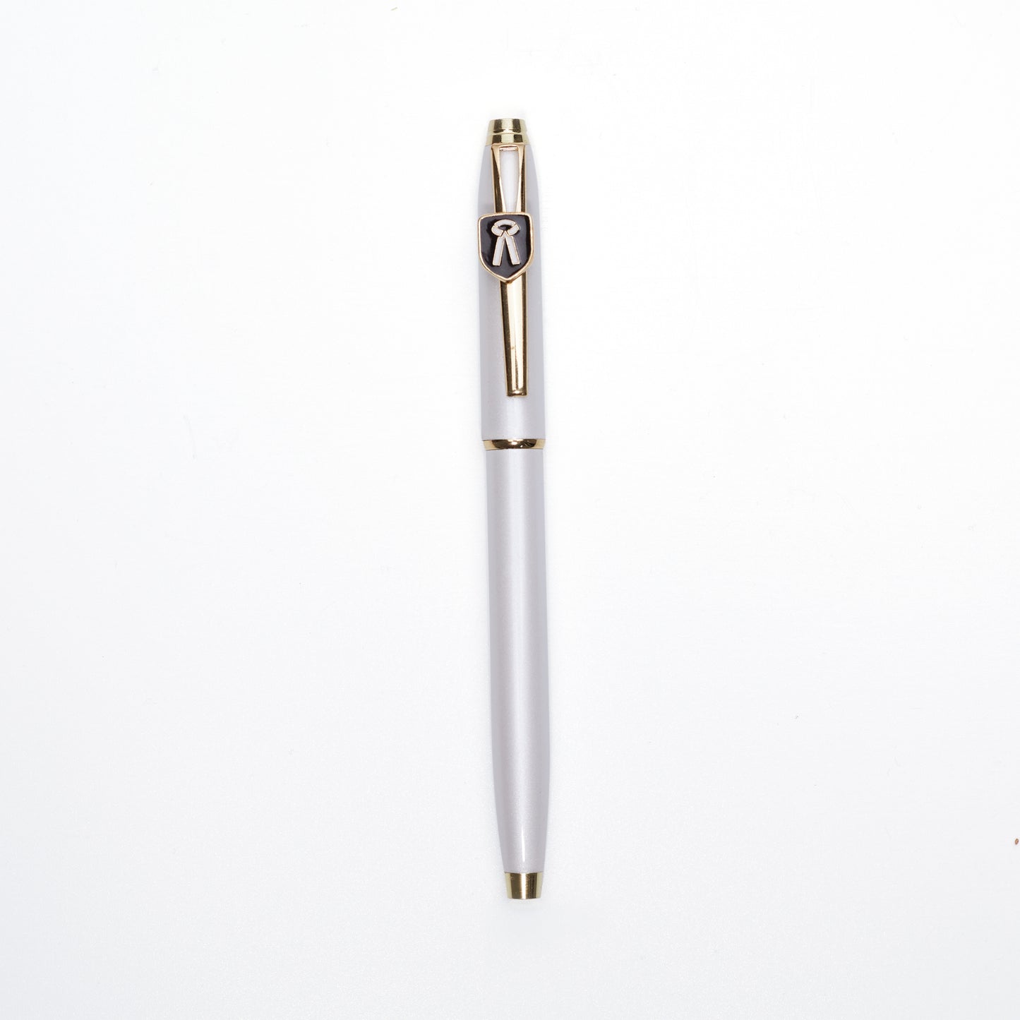 A ball pen with a metallic finish and a cap, featuring an advocate symbol on the top.