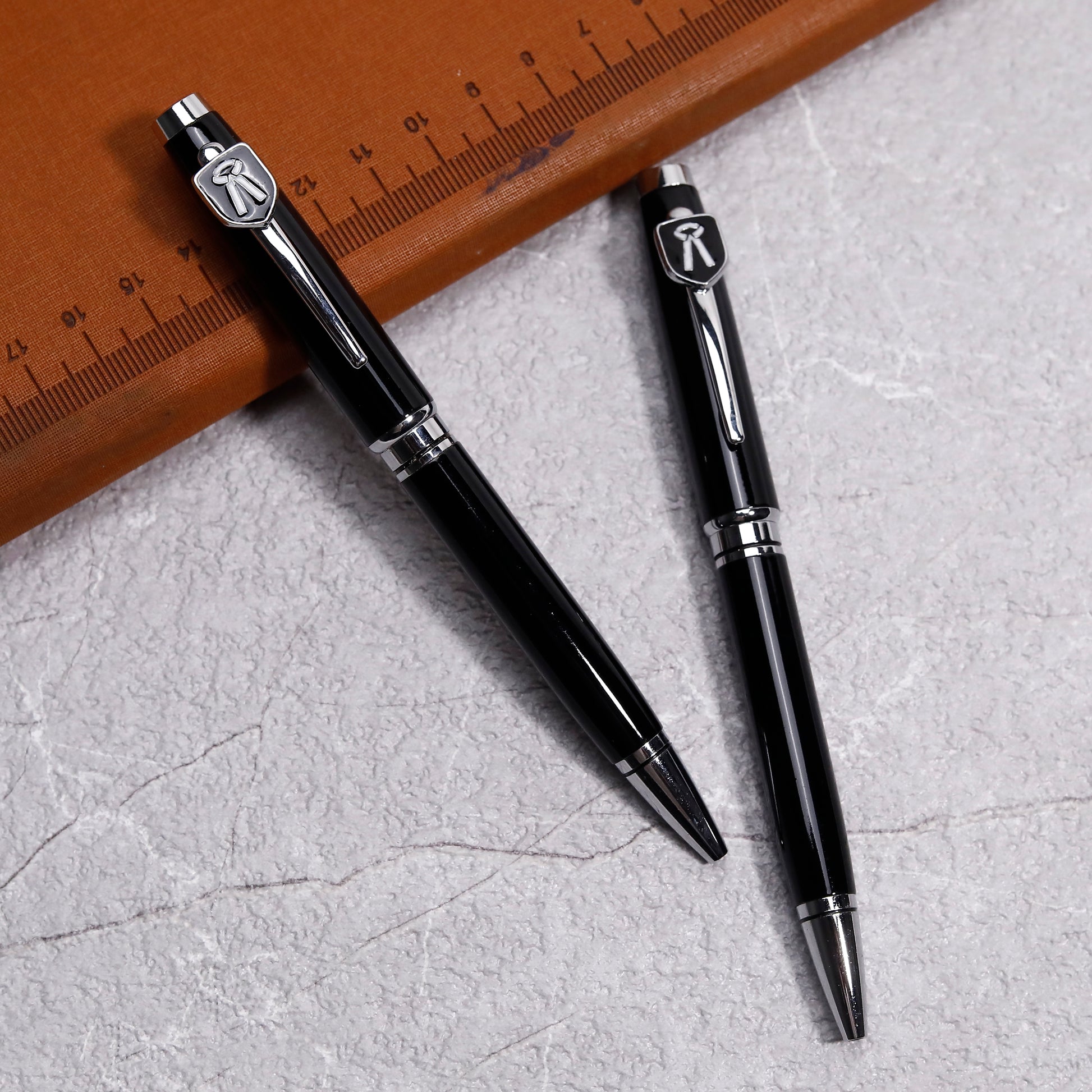 Elegant metallic ballpoint pen with advocate symbol

